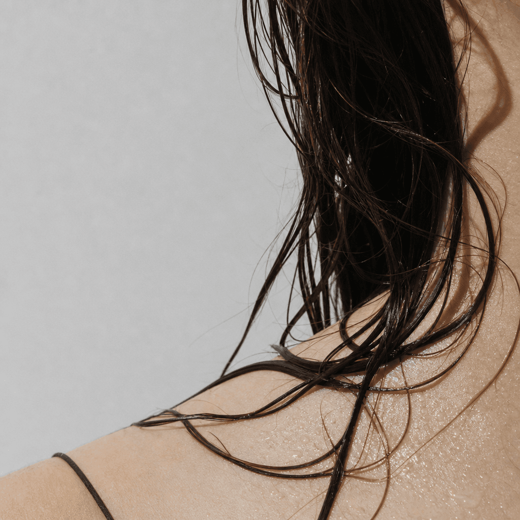 Water beading on calm, healthy skin