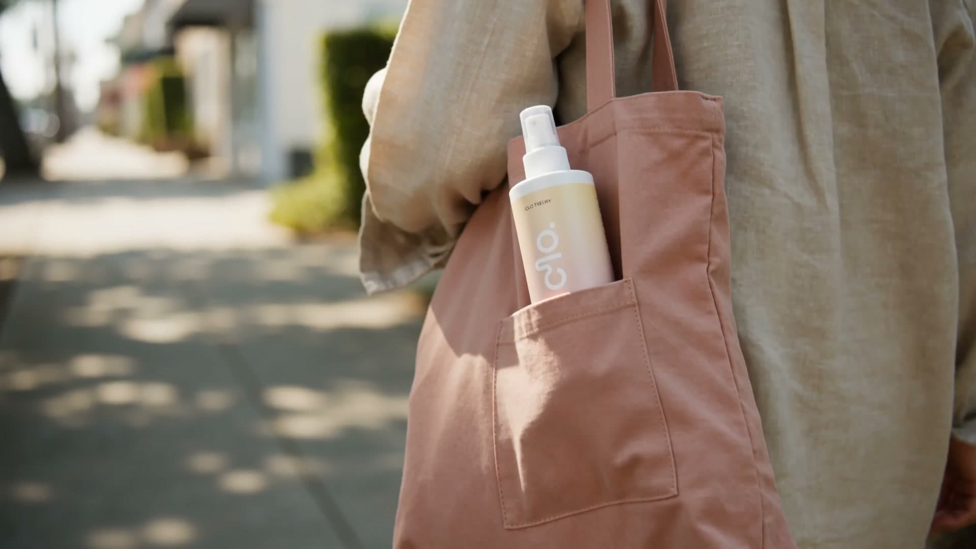 Clo Daily Cleansing Mist carried in a tote